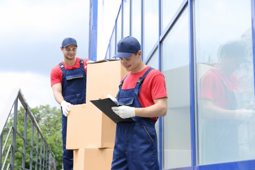 Moving team loading boxes for a local relocation in New Addington