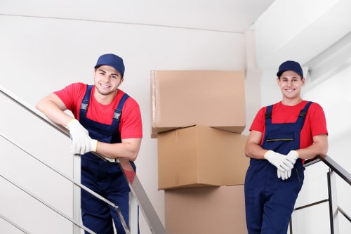 Local van removal team handling furniture in New Addington