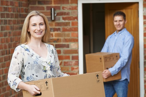 Packed boxes and moving van prepared for a local relocation