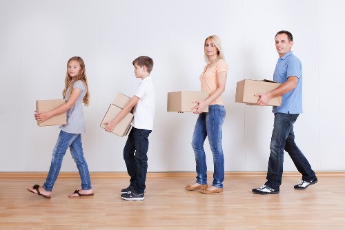 Loading furniture into a local moving van